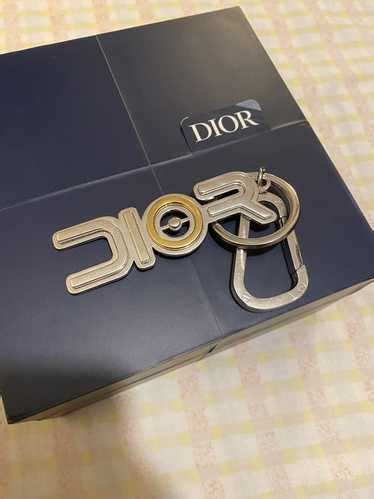 dior sorayama earring|DIOR AND SORAYAMA brass key ring.